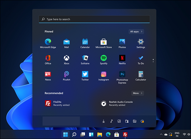 The Windows Start menu 11 with dark mode enabled.