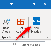 El botón "Ver encabezados" en la cinta de Outlook.