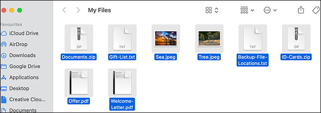 Todos los archivos seleccionados en una ventana del Finder.