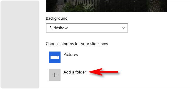 Después de seleccionar "Presentación de diapositivas", puede agregar una carpeta de imágenes para usar como presentación de diapositivas en la pantalla de bloqueo.