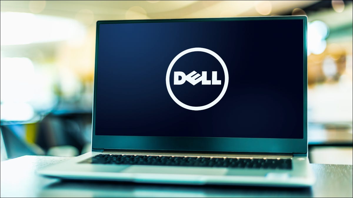 Open laptop with Dell logo visible on the screen