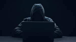 hacker-with-laptop-6662494-3153572-jpg-1732517