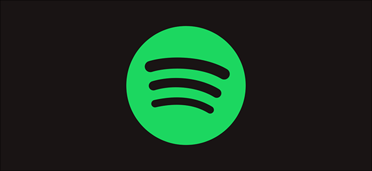 Un logo de Spotify verde sobre un fondo negro.